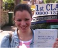 Eva with Driving test pass certificate